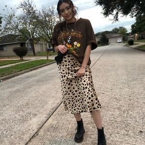Brand new cheetah print silk-like skirt available. All sizes available